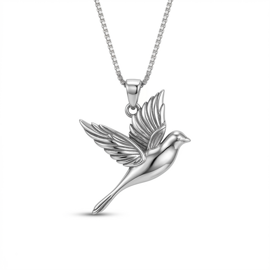 Silver bird pendant necklace on a white background
