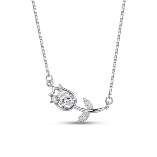 Silver necklace with a teardrop-shaped pendant on a white background